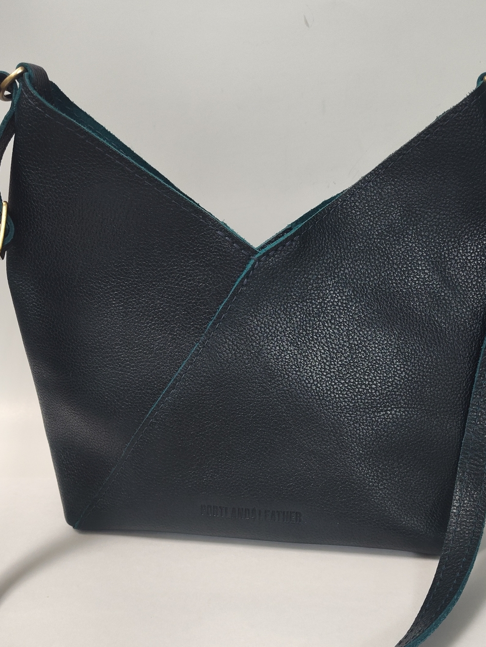 Portland Leather Teal-Trim Black Crossbody Bag